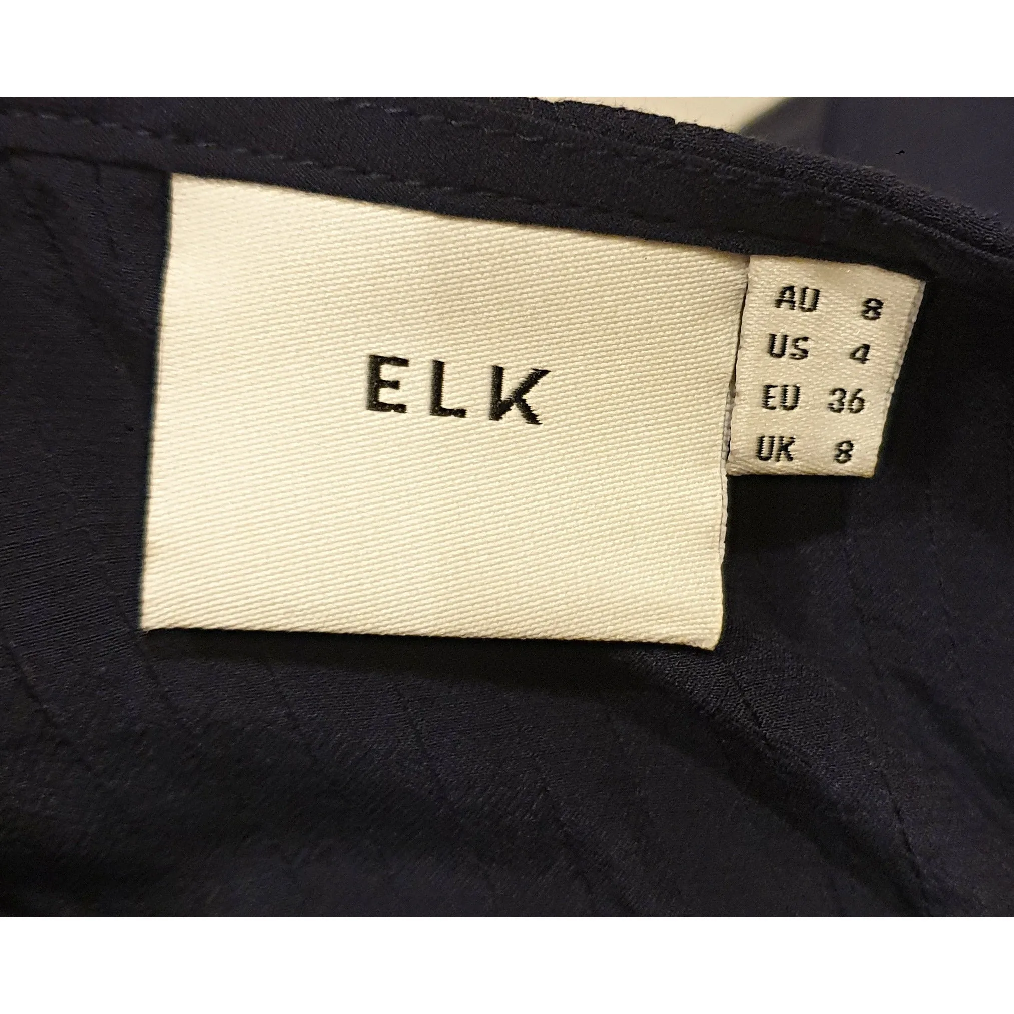 Elk dark navy sleeveless silk feel top with lovely back pleating size 8